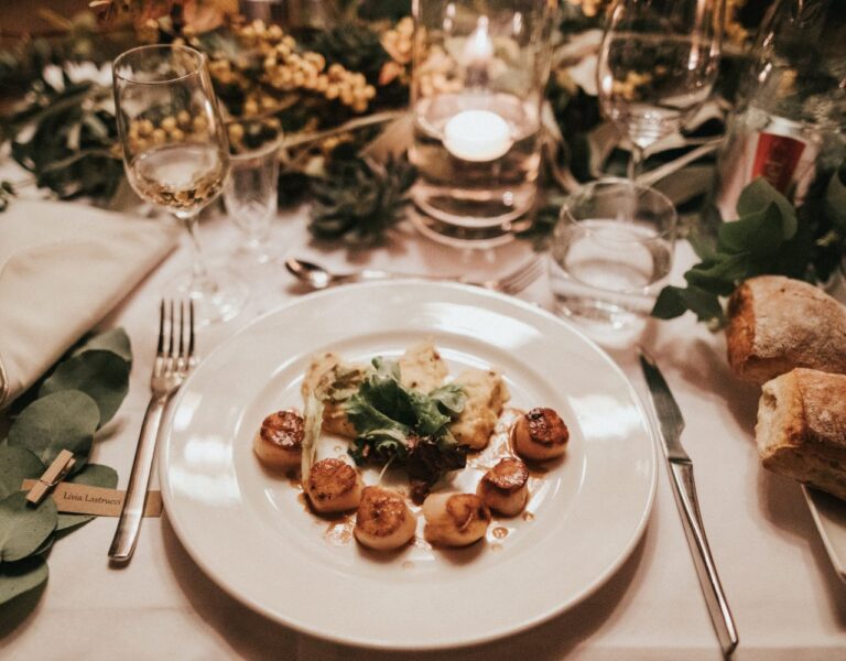 A beautifully arranged table setting featuring an array of fine food